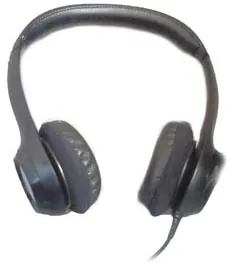 Black wired over-ear studio headphones with padded headband, cushioned earcups, and visible audio cable on seamless white background